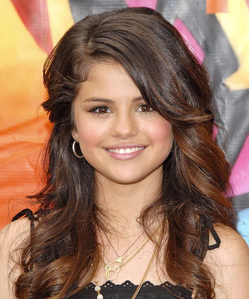 Selena Gomez Voluminous Hairstyle With Curls