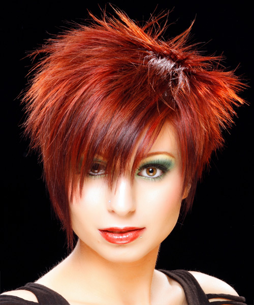 Short Bold And Sleek Red Hairstyle With Height And Volume