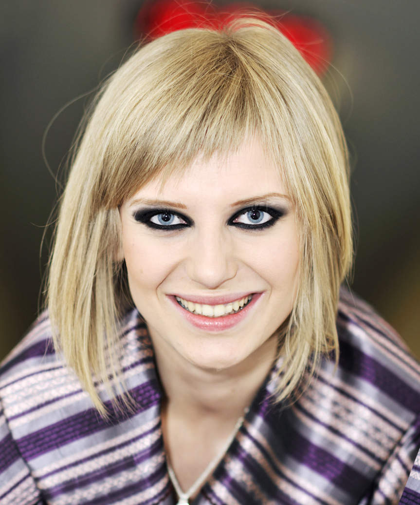 Medium-Length Bob Haircut With Asymmetrical Angled Bangs