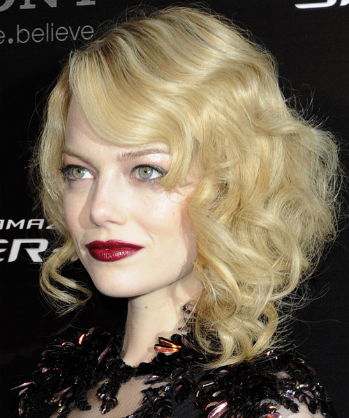 Emma Stone Medium Wavy    Golden Blonde   Hairstyle with Side Swept Bangs  and Light Blonde Highlights - side view