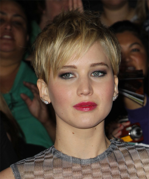 Jennifer Lawrence      Golden Blonde Pixie  Haircut with Side Swept Bangs  and Light Blonde Highlights - side on view