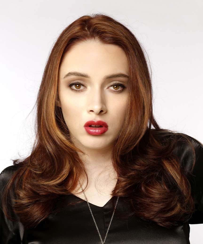 Long Red Wavy Hairstyle With Large Curls