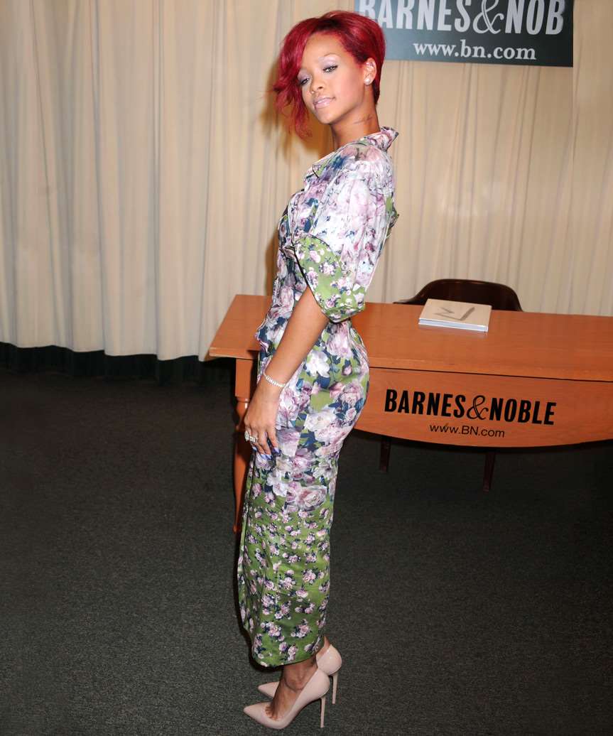 Rihanna Hot Red Updo with Side Swept Bangs - side on view