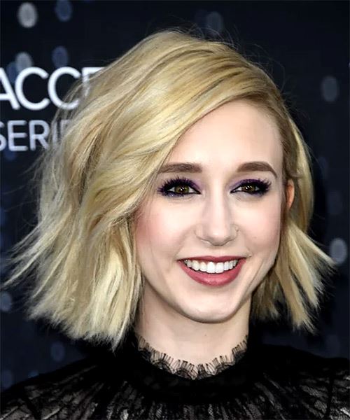 Taissa Farmiga Medium Wavy  Bob  Haircut with Blunt Cut Bangs - side on view