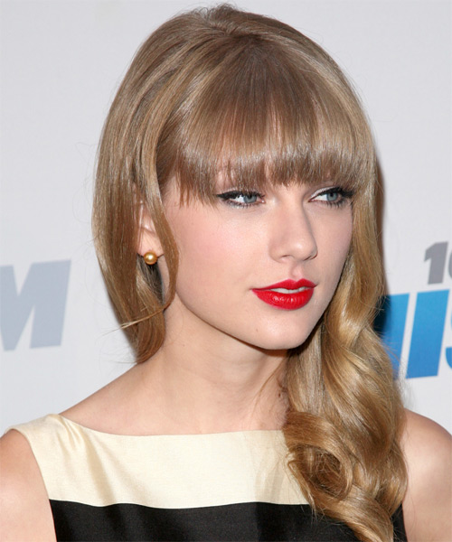 Taylor Swift Long Wavy    Honey Blonde   Hairstyle with Blunt Cut Bangs - side on view